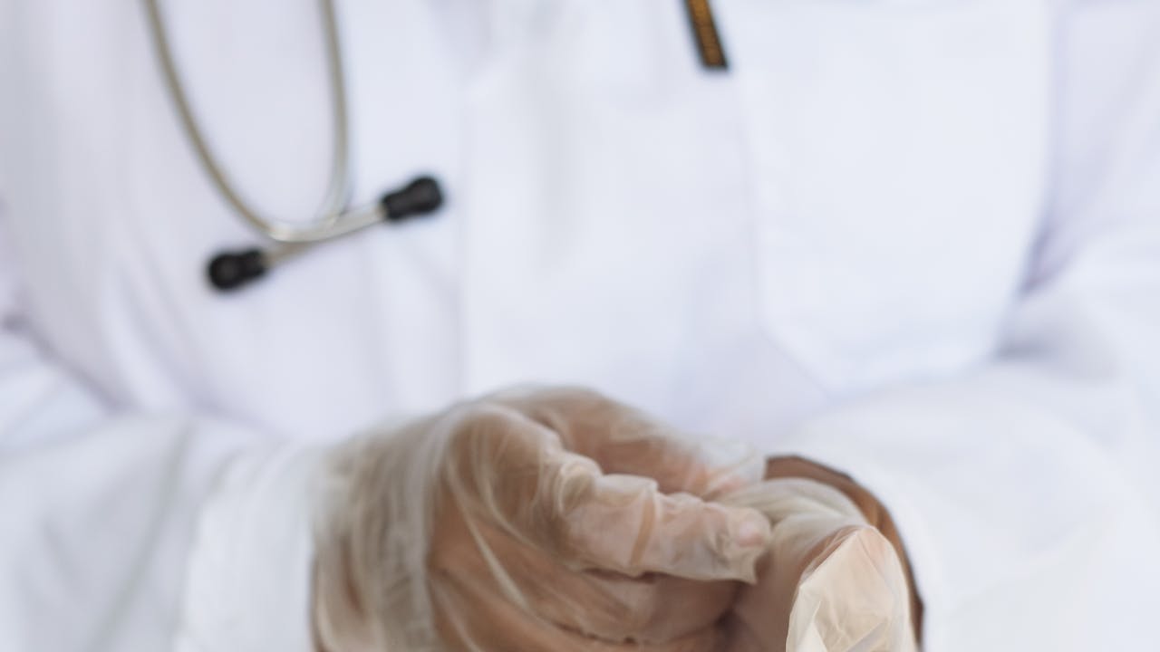 Scientific research laboratory setting with glass vials and scientific equipment