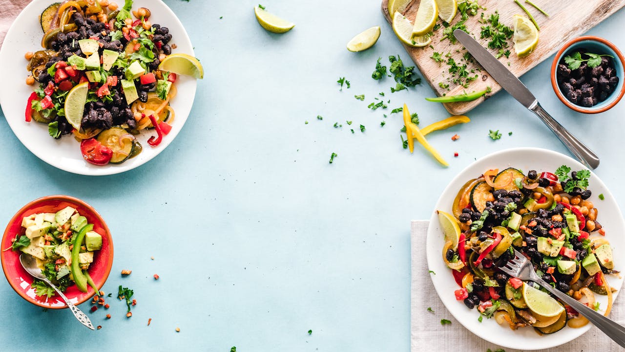 Colorful array of fresh vegetables and supplements arranged on a clean white surface, nutrition and gut health concept