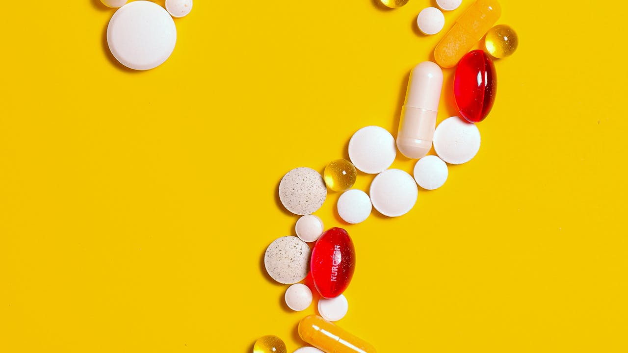 Supplement capsules arranged on a white surface