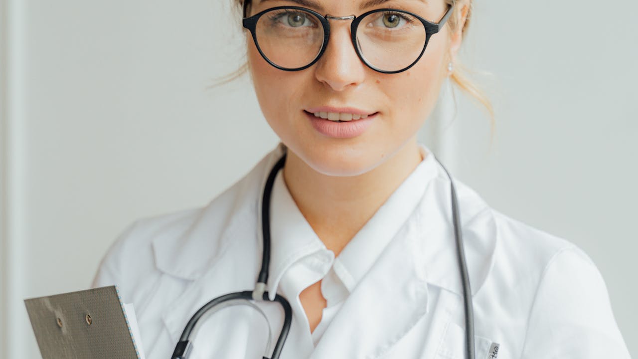Person consulting with a healthcare provider about longevity supplements and protocols