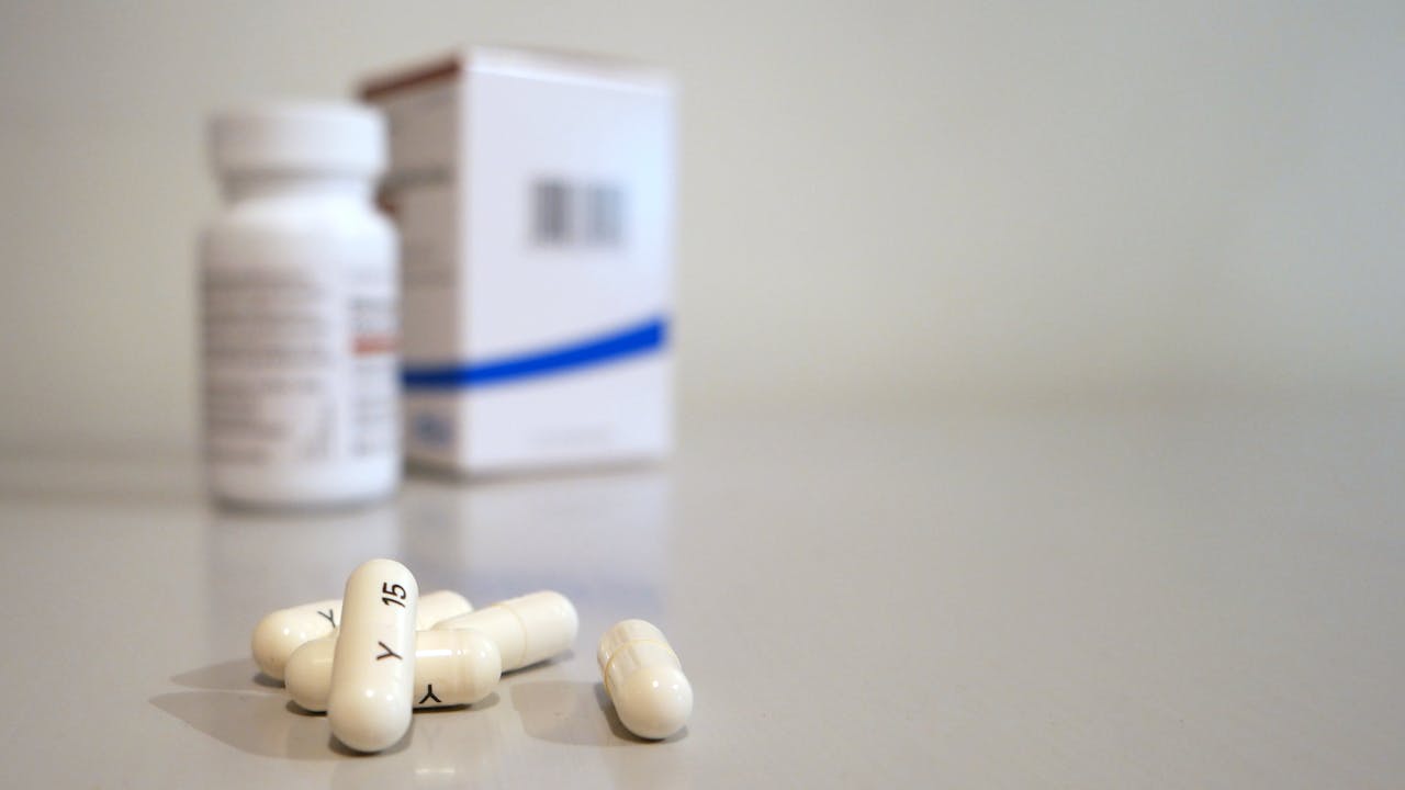 Supplement capsules and health supplements arranged on a clean surface