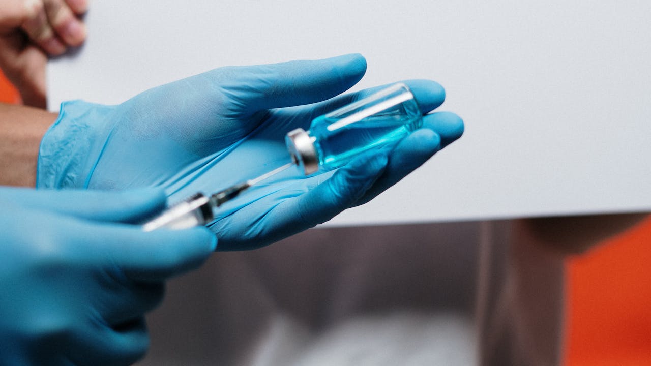 IV therapy supplies and medical professional with vials